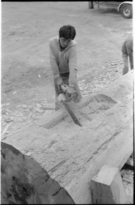 Crew working on log at the Turnbull & Gail construction yard in Richmond (contractors for bui...