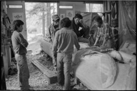 Crew and log at the old UBC carving shed