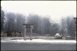 The mortuary house being reassembled