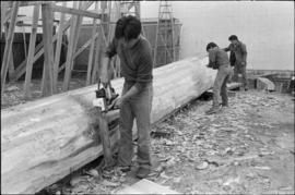 Crew working on log at the Turnbull & Gail construction yard in Richmond (contractors for bui...